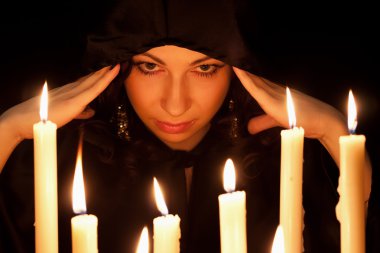 The woman and candles clipart