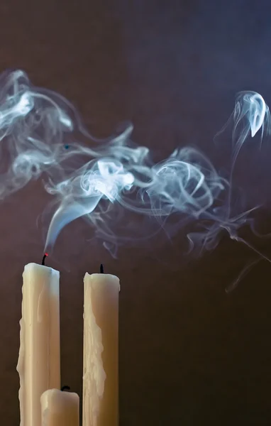 Three candles and smoke — Stock Photo, Image