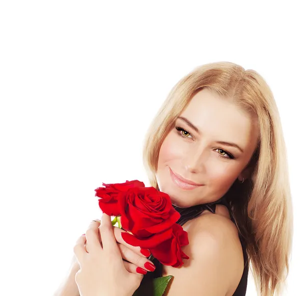 Красивая женщина с букетом красных роз — стоковое фото