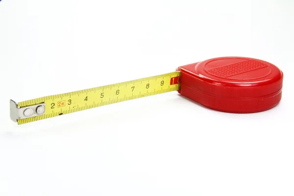 Meter om te meten in het rood op een witte achtergrond — Stockfoto