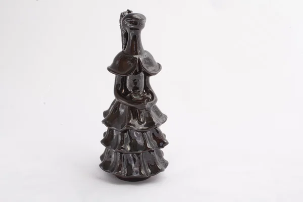 Figurita de cerámica negra sobre blanco —  Fotos de Stock