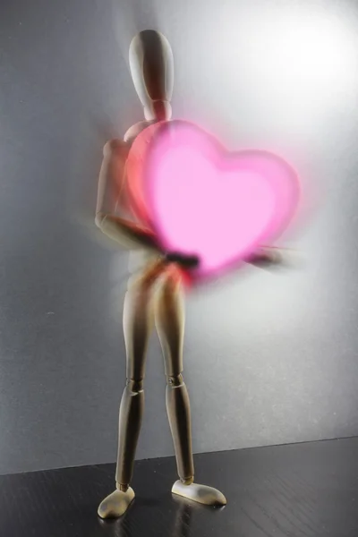 Abstract love doll with a heart