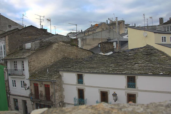 Roofs of houses and typical Spanish village using a short — Stock Photo, Image