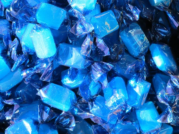 Bonbons colorés lumineux bleu — Photo