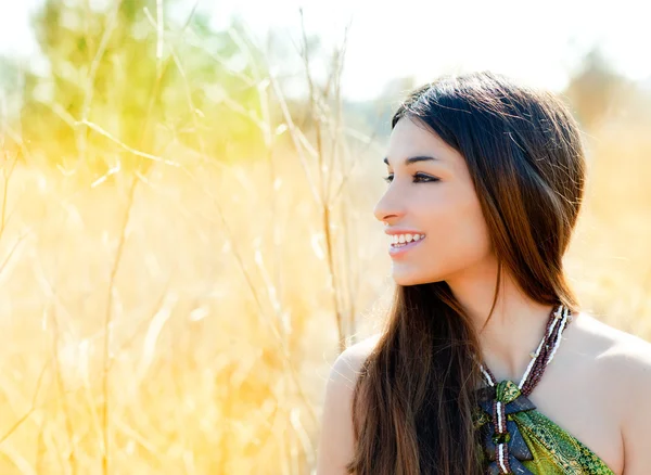 Asian indian woman profile portrait in golden field — Stock Photo, Image