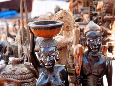 African handcraft dark wood carved figures clipart