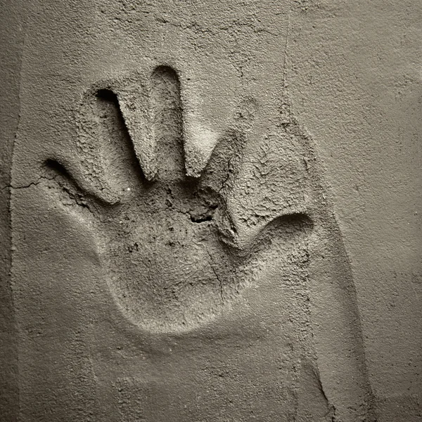 Hand print on cement mortar wall — Stock Photo, Image