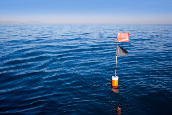 Longliner and trammel net buoy with flag pole — Stock Photo, Image