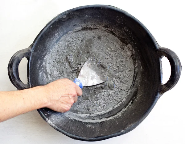 Cemento portland grigio malta fresca mix con spatola — Foto Stock