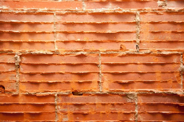 Briques brisées dans le mur de briques en restauration murale — Photo