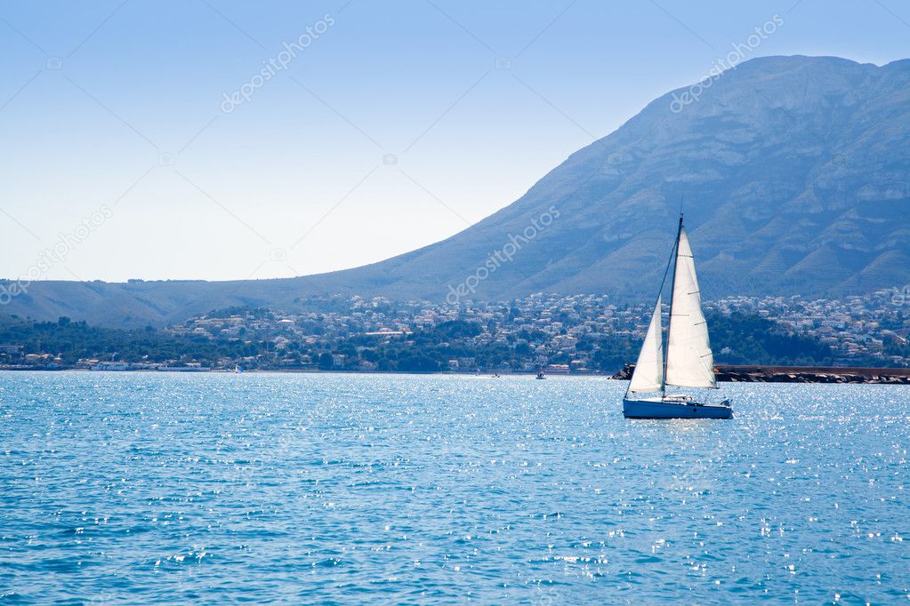 Sailboat sailing in Mediterranean sea in Denia