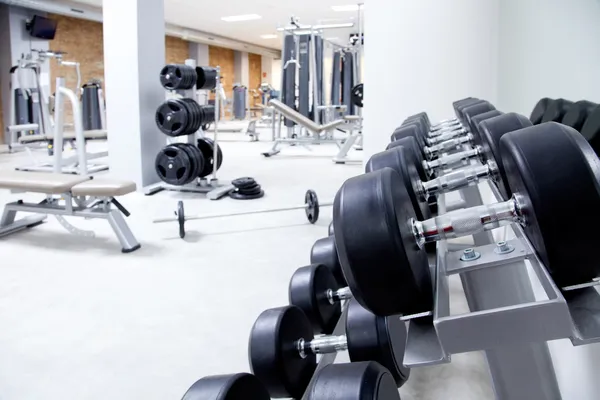Fitness clube equipamento de treinamento de peso ginásio — Fotografia de Stock