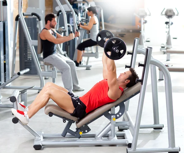 Group with weight training equipment on sport gym Royalty Free Stock Images