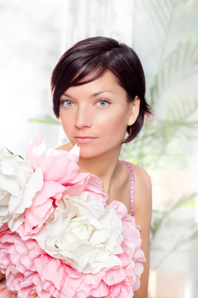 Beautiful flowers woman with spring pink dress Stock Photo