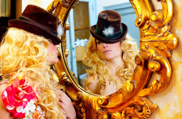 Fashion blond woman with hat in baroque golden mirror — Stock Photo, Image
