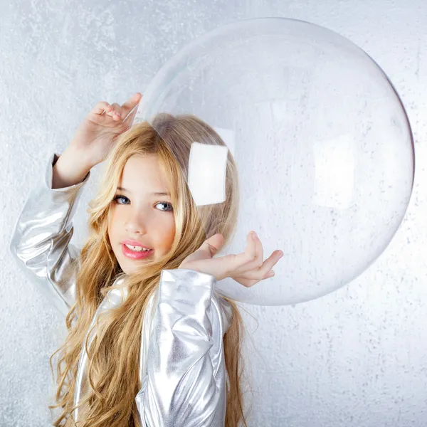 Astronaut girl with silver uniform and glass helmet — Stock Photo, Image