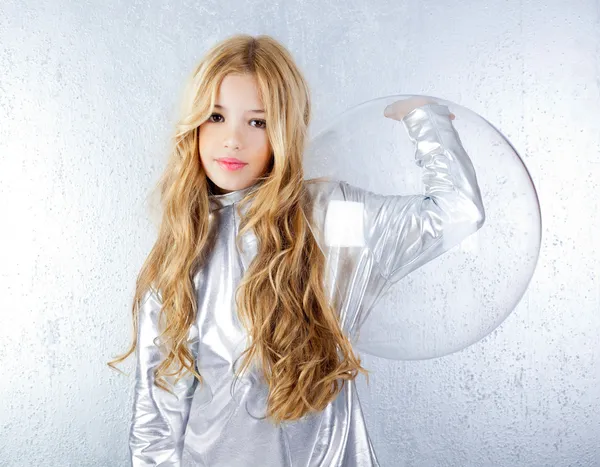 Astronaut girl with silver uniform and glass helmet — Stock Photo, Image