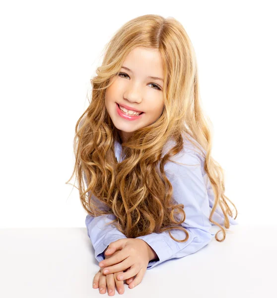 Blond kid little girl portrait smiling on a desk in white — Stock Photo, Image