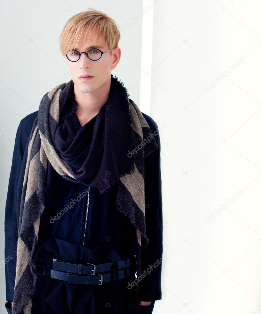 Blond modern handsome student man with nerd glasses