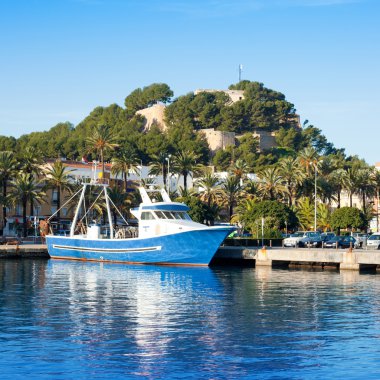 Denia mediterranean port village with castle clipart