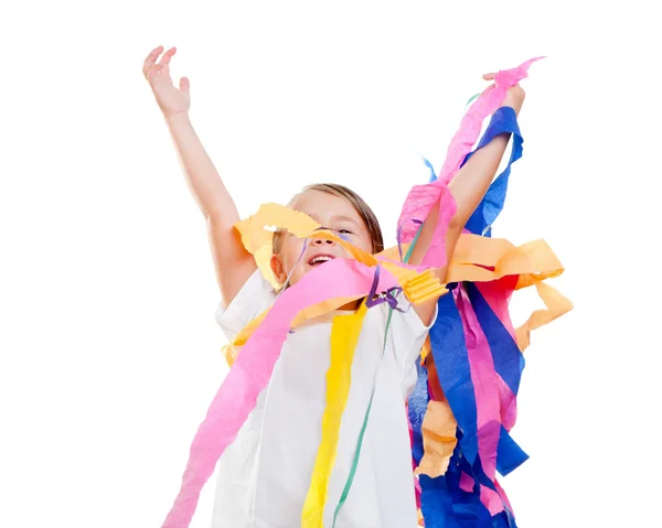 Niños niño en una fiesta con papel colorido desordenado — Foto de Stock