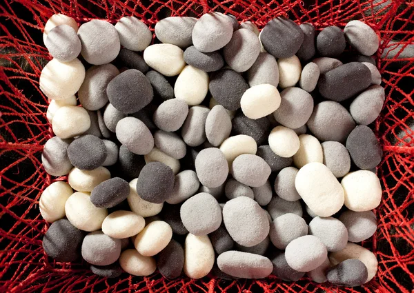 Schuim nep rolling stones in wit en grijs — Stockfoto