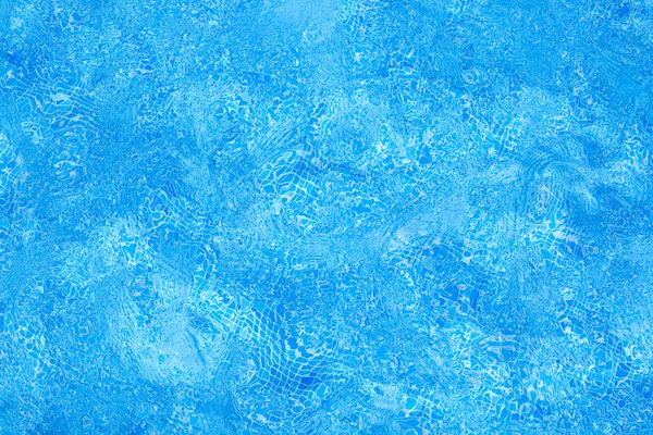 Blauwe tegels zwembad water rimpel textuur — Stockfoto