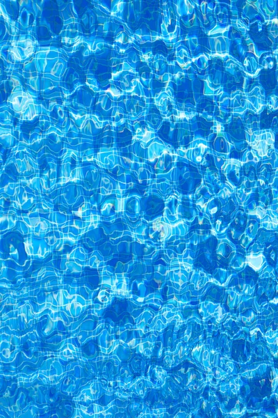 Azulejos azules piscina agua ondulación textura — Foto de Stock