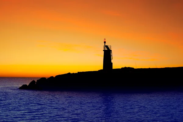 Golden sunrise sunset i havet röd fyr fyr — Stockfoto