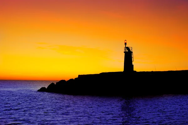 Goldener Sonnenaufgang Sonnenuntergang im Meer roter Leuchtturm — Stockfoto