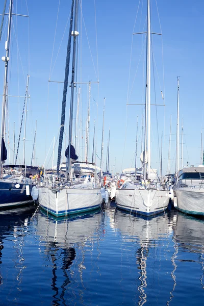 Blue sea boats moored in mediterranean marina — Stock Photo, Image