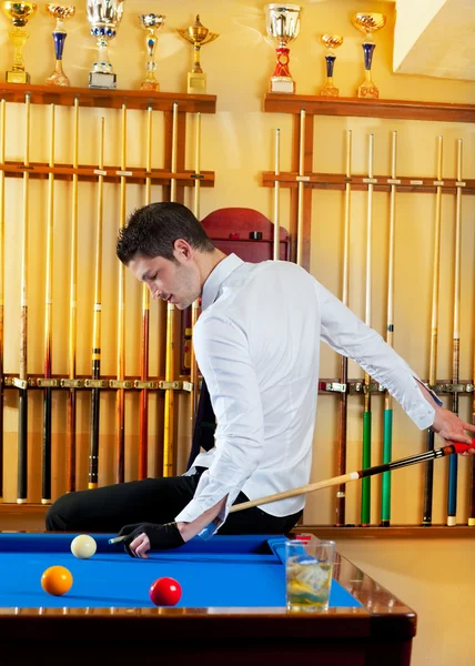 Billiard winner handsome man playing with cue — Stock Photo, Image
