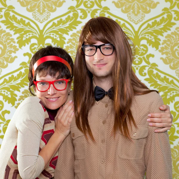 stock image Funny humor nerd couple on vintage wallpaper