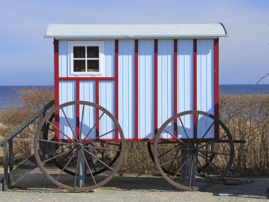 Historic bath car at the Baltic Sea clipart