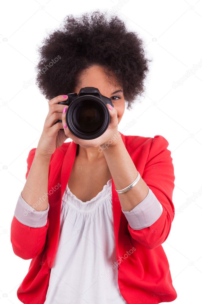 Young african american photographer with camera