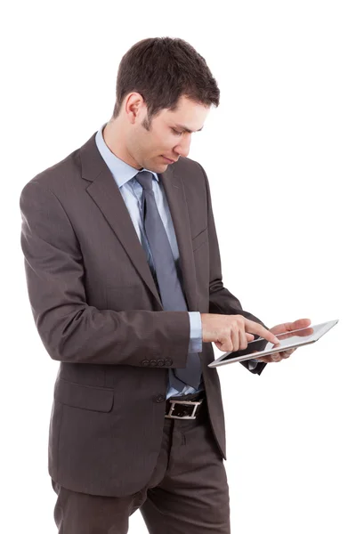 Young caucasian businessman using a tablet pc Royalty Free Stock Images