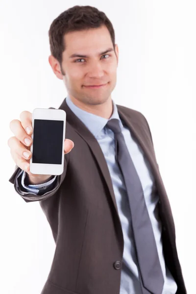 Fiatal cuacasian üzletember mutatja valami egy okostelefon — Stock Fotó