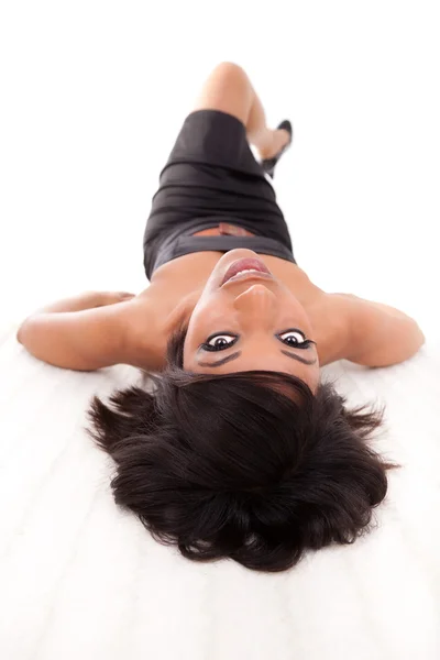 Young beautiful black woman lying down on the floor — Stock Photo, Image