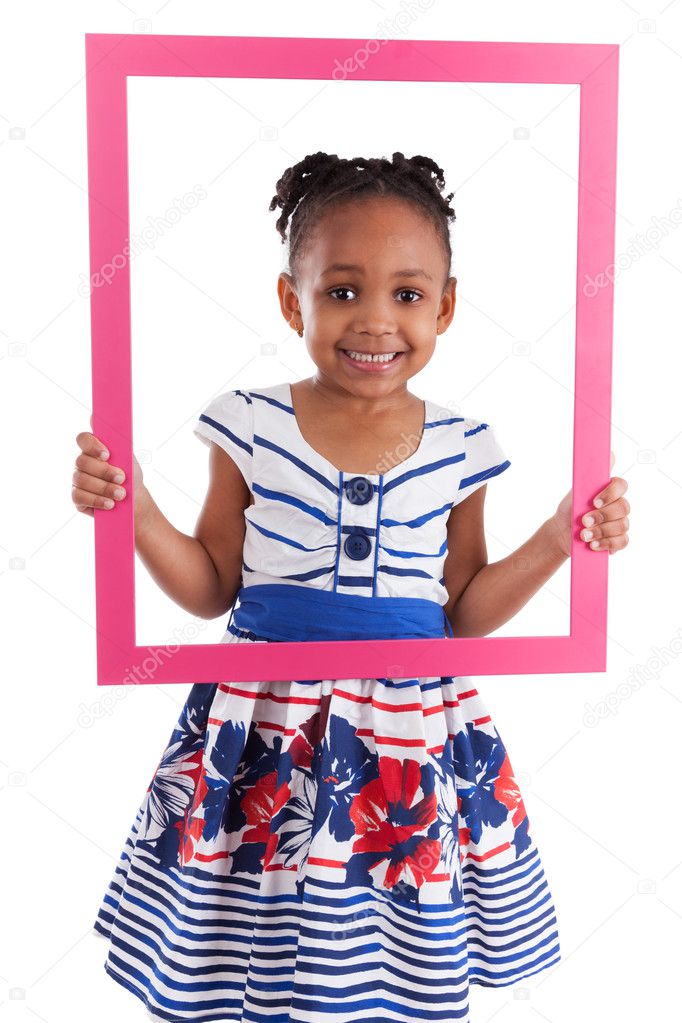 Little african american girl holding a picture frame