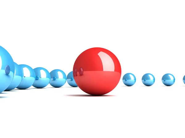 Esfera líder roja con esferas subordinadas azules —  Fotos de Stock