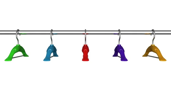 stock image Colorful coat hangers on a clothes rail close up on white background