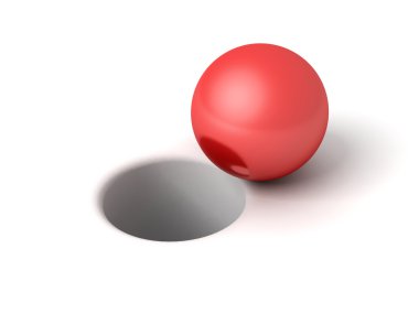 önünde delik beyaz zemin üzerine kırmızı parlak top