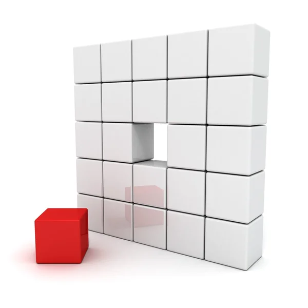 Individualiteit rode kubus als deeltje van bakstenen muur — Stockfoto