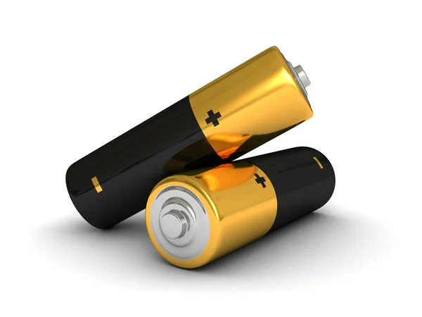 Duas baterias de baixo custo em fundo branco — Fotografia de Stock