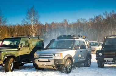 SUV on a Russian winter clipart