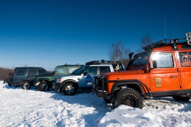 SUVs on snow clipart