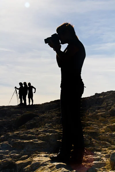 Fotoğraf çekmeyi silhouettes — Stok fotoğraf