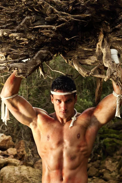 stock image Fighter man with giant rock