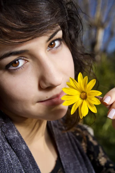 Stock image Beautiful girl with yellow flower