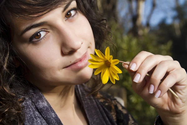 stock image Beautiful girl with yellow flower